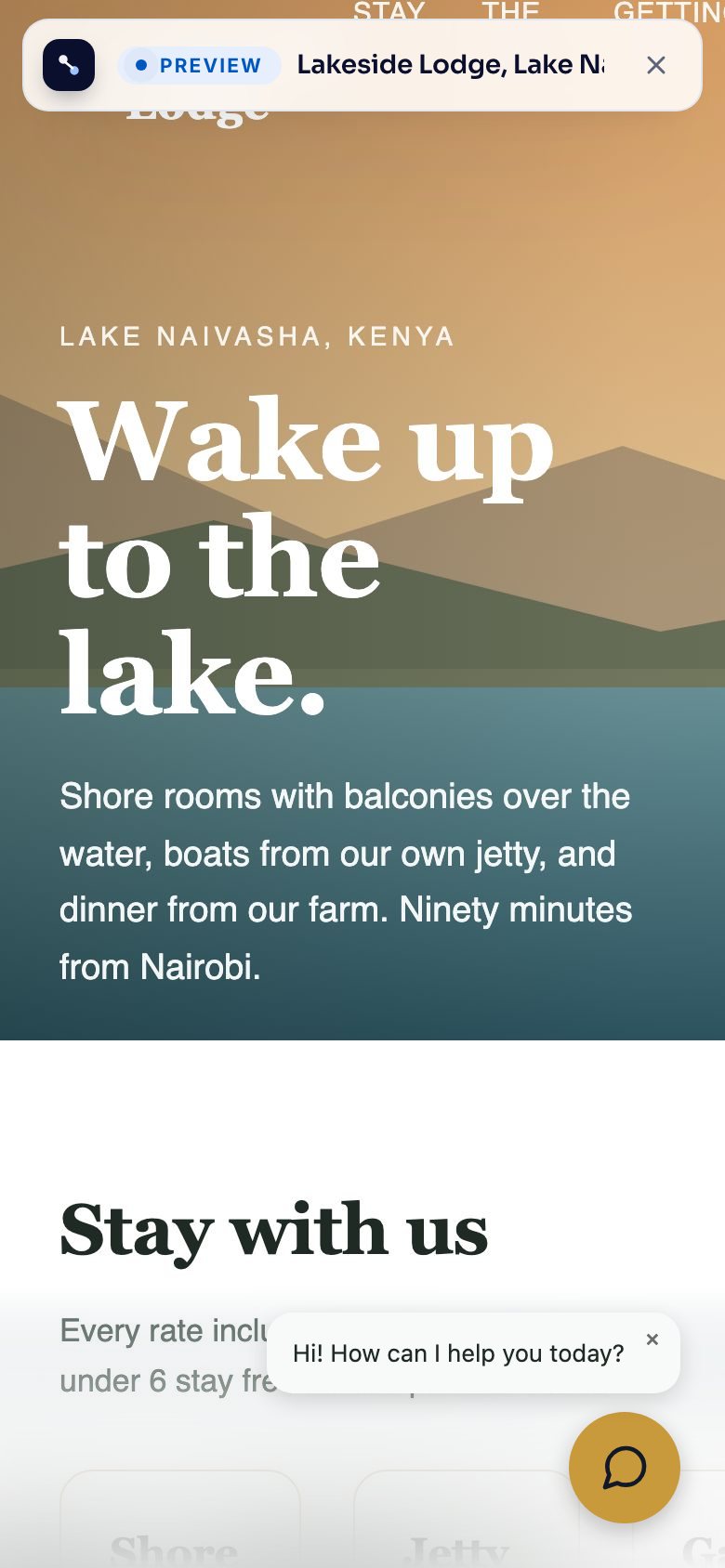 The pitch on a phone: the Lakeside Lodge site with a "Hi! How can I help you today?" bubble above the chat button